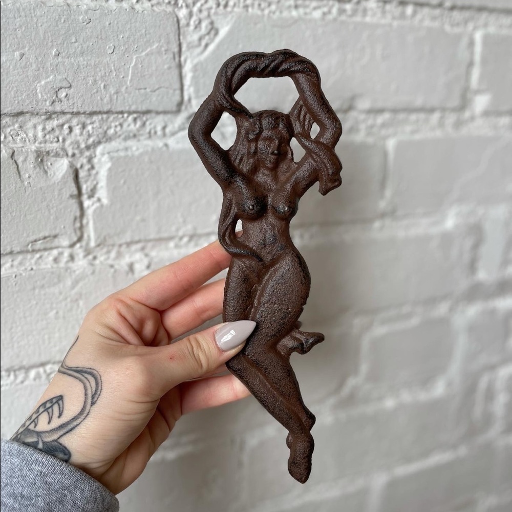 Antique bottle opener